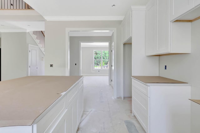 7452 Peytons Rise Way Lot # 52, Georgetown, TN 37336 - kitchen featuring white cabinetry, crown molding, and light countertops