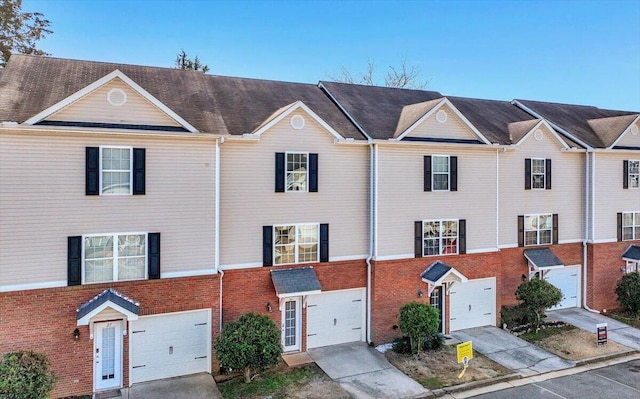39 Middlebrook Dr, Cartersville, GA 30120 - view of property with a garage, brick siding, and concrete driveway
