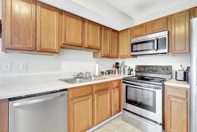 39 Middlebrook Dr, Cartersville, GA 30120 - kitchen with stainless steel appliances, a sink, and light countertops