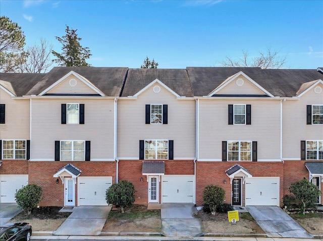 39 Middlebrook Dr, Cartersville, GA 30120 - view of property featuring concrete driveway, brick siding, and an attached garage