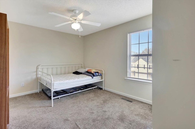 39 Middlebrook Dr, Cartersville, GA 30120 - bedroom featuring carpet floors, a textured ceiling, baseboards, and ceiling fan