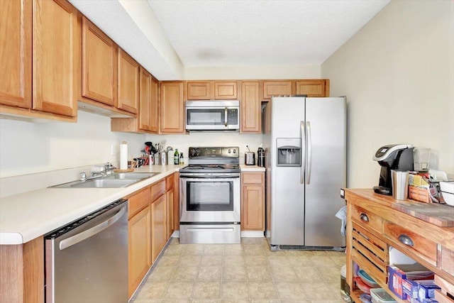 39 Middlebrook Dr, Cartersville, GA 30120 - kitchen with stainless steel appliances, a sink, and light countertops