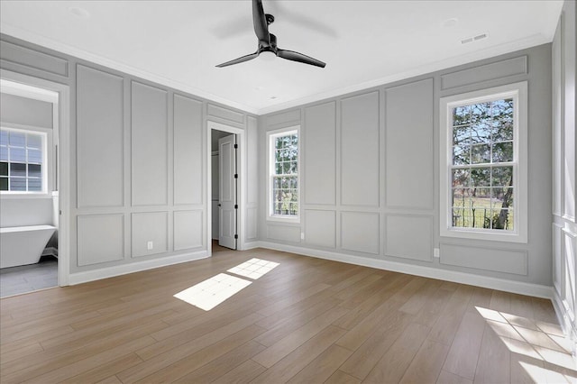 8656 Becket Way Lot # 5, Ooltewah, TN 37363 - unfurnished bedroom with a decorative wall, light wood finished floors, a ceiling fan, and ornamental molding