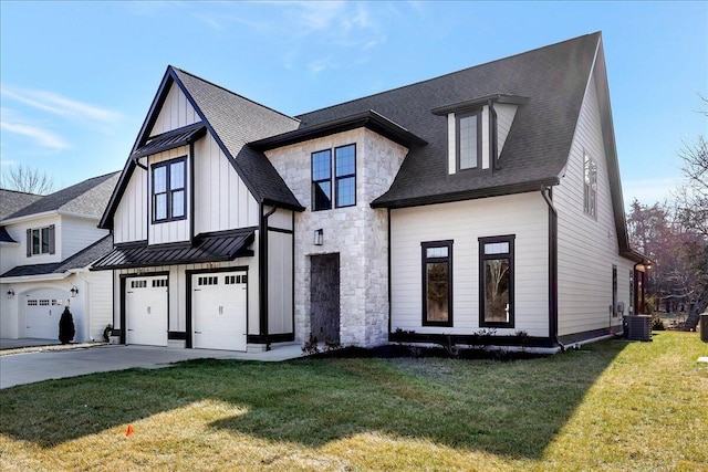 8656 Becket Way Lot # 5, Ooltewah, TN 37363 - view of front of home with an attached garage, concrete driveway, a standing seam roof, a front lawn, and board and batten siding