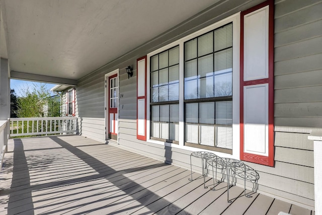 wooden terrace with covered porch