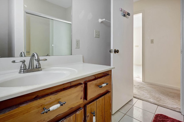 bathroom featuring tile patterned floors and vanity