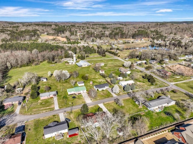 aerial overview of property's location with nearby suburban area