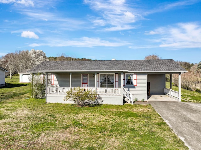 single story home with covered porch, driveway, a carport, a front yard, and roof with shingles