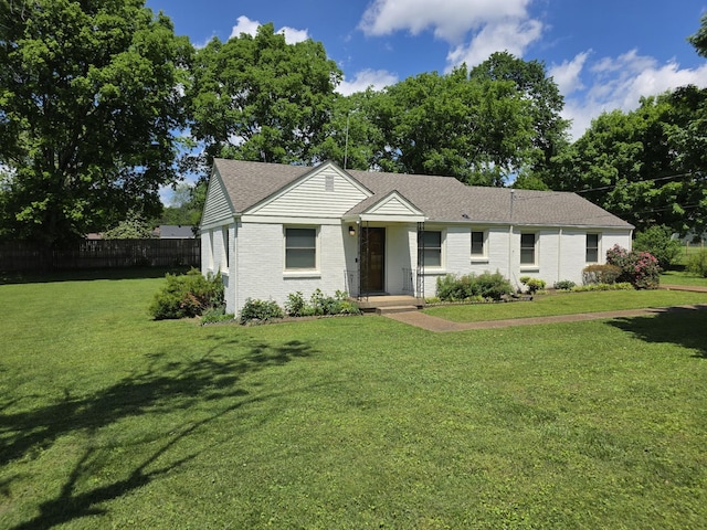 single story home with brick siding and roof with shingles