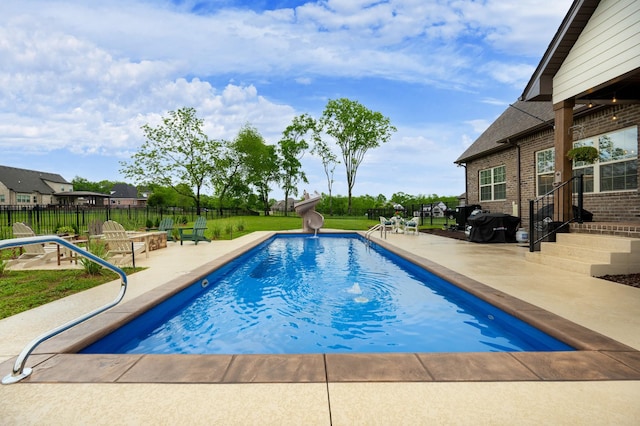 105 Bowwater Pl, Gallatin, TN 37066 - view of pool featuring a water slide, a patio area, and fence
