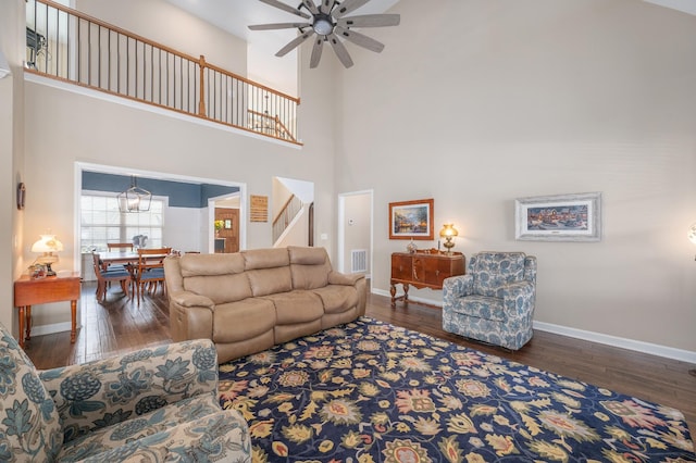 105 Bowwater Pl, Gallatin, TN 37066 - living room with a high ceiling, hardwood / wood-style flooring, ceiling fan, stairs, and baseboards