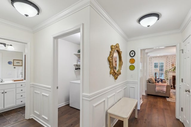 3348 Berryside Dr, Murfreesboro, TN 37128 - corridor with washer / clothes dryer, ornamental molding, a wainscoted wall, dark wood-style flooring, and a decorative wall
