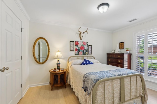 3348 Berryside Dr, Murfreesboro, TN 37128 - bedroom with light wood-style flooring, crown molding, and baseboards