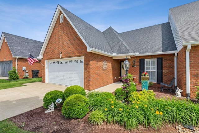 3348 Berryside Dr, Murfreesboro, TN 37128 - view of front of home featuring a garage, brick siding, concrete driveway, and roof with shingles