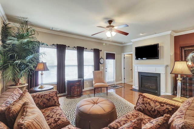 3157 Locust Holw, Nolensville, TN 37135 - living area with a ceiling fan, wood finished floors, a fireplace with flush hearth, crown molding, and baseboards