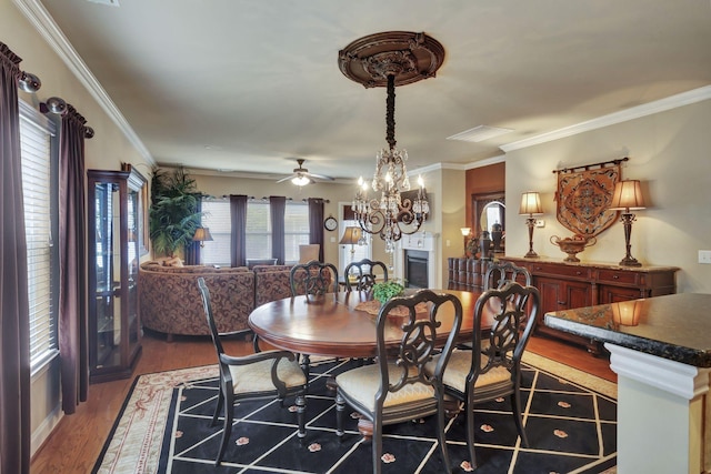 3157 Locust Holw, Nolensville, TN 37135 - dining area with wood finished floors, ceiling fan, crown molding, and a chandelier