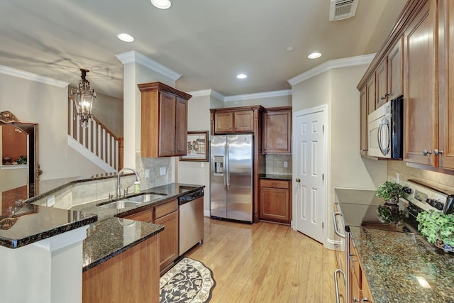 3157 Locust Holw, Nolensville, TN 37135 - kitchen featuring stainless steel appliances, a sink, backsplash, recessed lighting, and dark stone counters
