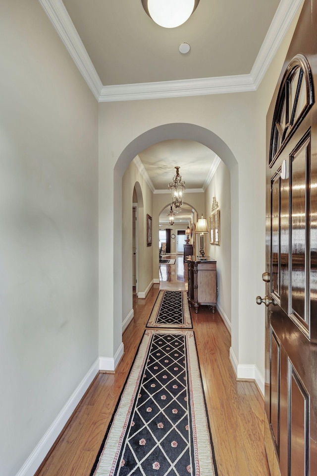 3157 Locust Holw, Nolensville, TN 37135 - hall featuring arched walkways, light wood-style floors, ornamental molding, and baseboards