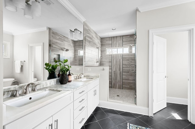 bathroom featuring a shower stall, tile patterned floors, toilet, ornamental molding, and double vanity