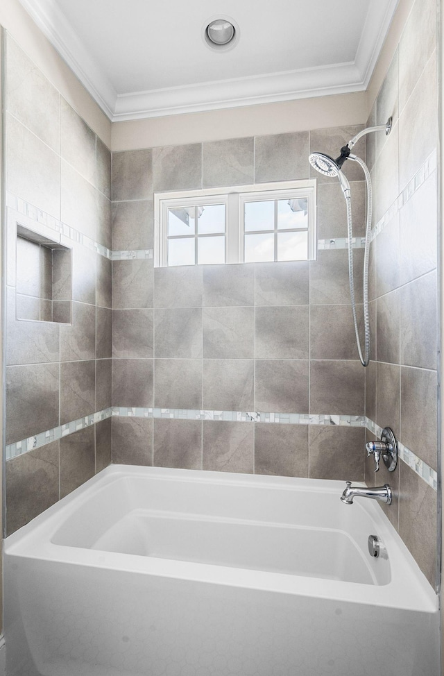 full bath with ornamental molding and tub / shower combination