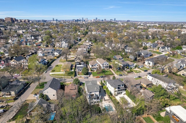 aerial view of property and surrounding area with nearby suburban area and nearby urban area