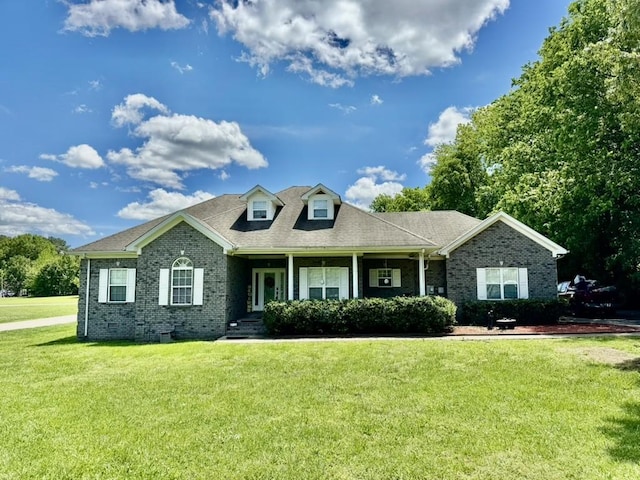 435 Long St W, Mc Ewen, TN 37101 - view of front of home featuring brick siding and a front yard