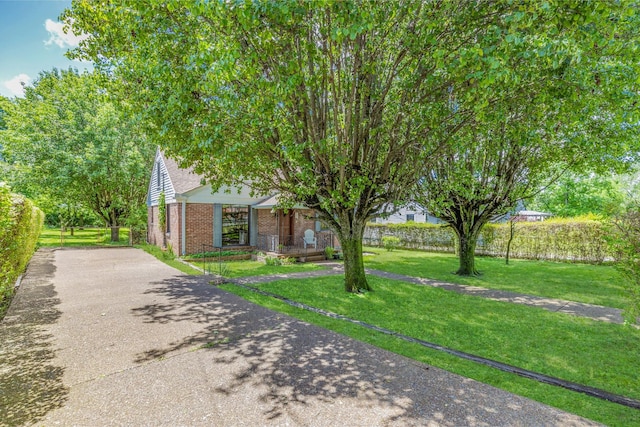 517 Drake Ave, Nashville, TN 37211 - view of front facade featuring brick siding and driveway