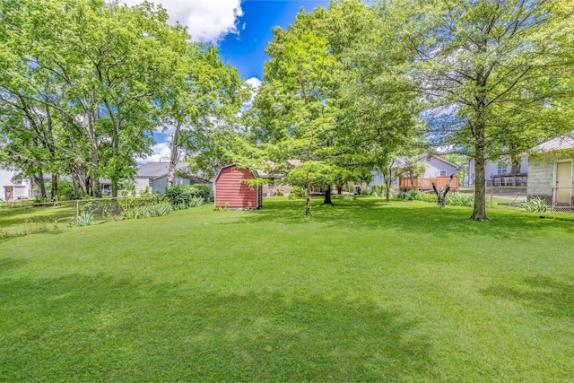 517 Drake Ave, Nashville, TN 37211 - view of yard featuring a storage unit and an outbuilding