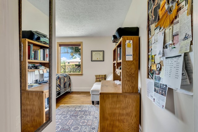 517 Drake Ave, Nashville, TN 37211 - office space with a textured ceiling, wood finished floors, and baseboards