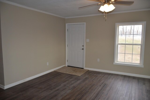 311 Gip Manning Rd, Clarksville, TN 37042 - empty room with dark wood-style flooring, ceiling fan, baseboards, and crown molding