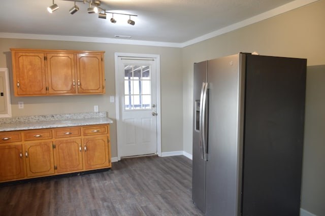311 Gip Manning Rd, Clarksville, TN 37042 - kitchen featuring stainless steel fridge, dark wood finished floors, light countertops, brown cabinets, and baseboards