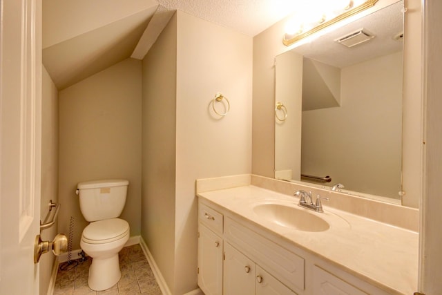 2172 Memorial Dr Unit C3, Clarksville, TN 37043 - bathroom with toilet, vanity, a textured ceiling, tile patterned flooring, and baseboards