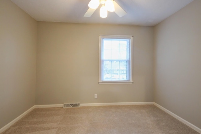 2172 Memorial Dr Unit C3, Clarksville, TN 37043 - spare room featuring light carpet, baseboards, and ceiling fan
