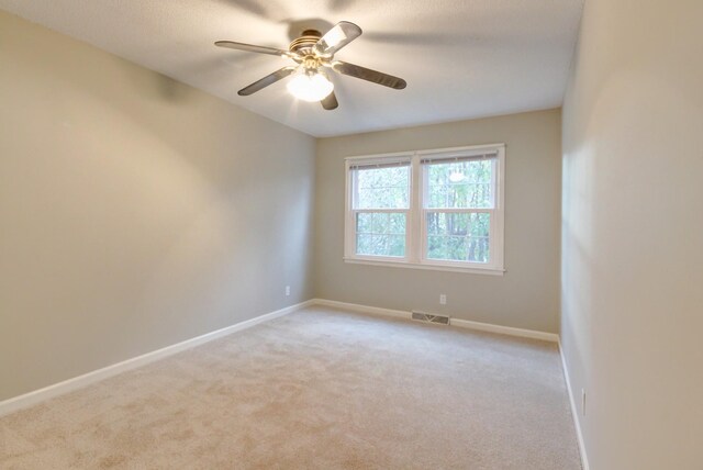 2172 Memorial Dr Unit C3, Clarksville, TN 37043 - empty room with light carpet, baseboards, and ceiling fan