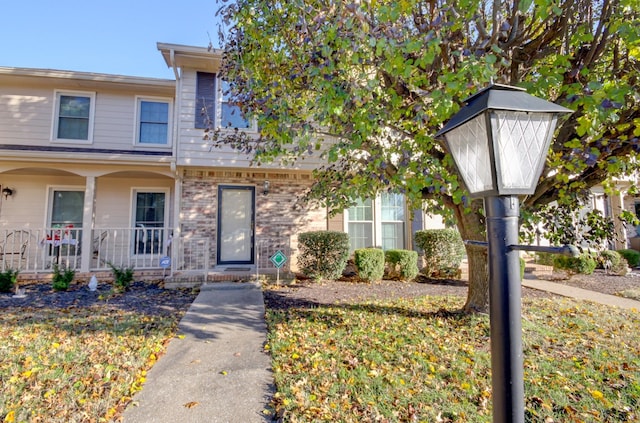 2172 Memorial Dr Unit C3, Clarksville, TN 37043 - townhome / multi-family property with a porch