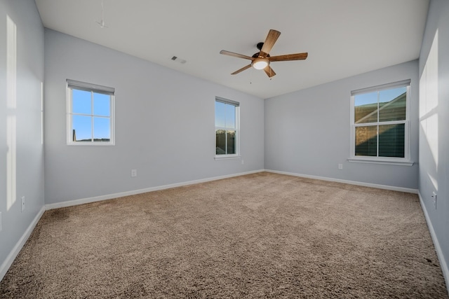 474 Parmley Dr, Nashville, TN 37207 - carpeted empty room featuring plenty of natural light, a ceiling fan, and baseboards