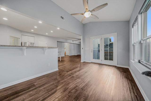 474 Parmley Dr, Nashville, TN 37207 - unfurnished living room with a ceiling fan, dark wood-style floors, recessed lighting, baseboards, and high vaulted ceiling