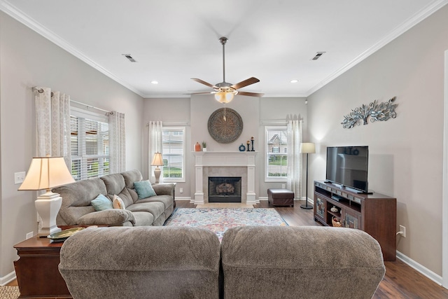 2139 Stonecenter Ln, Murfreesboro, TN 37128 - living area with healthy amount of natural light, wood finished floors, recessed lighting, ceiling fan, and baseboards