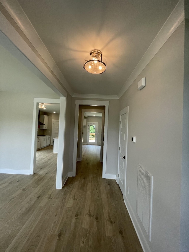 224 Settlers Way, Hendersonville, TN 37075 - hall with wood finished floors, baseboards, and ornamental molding