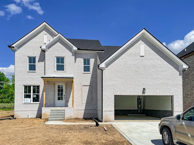 112 Hayden Ln, Gallatin, TN 37066 - view of front of house with concrete driveway and brick siding
