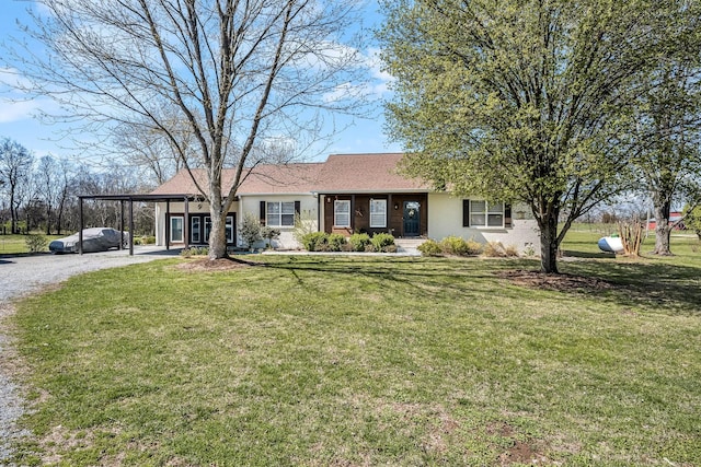 ranch-style house featuring driveway, a front lawn, roof with shingles, and brick siding