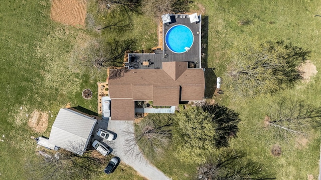 view from above of property featuring a pool area