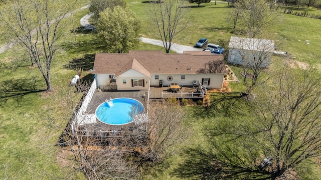 view of swimming pool featuring a wooden deck