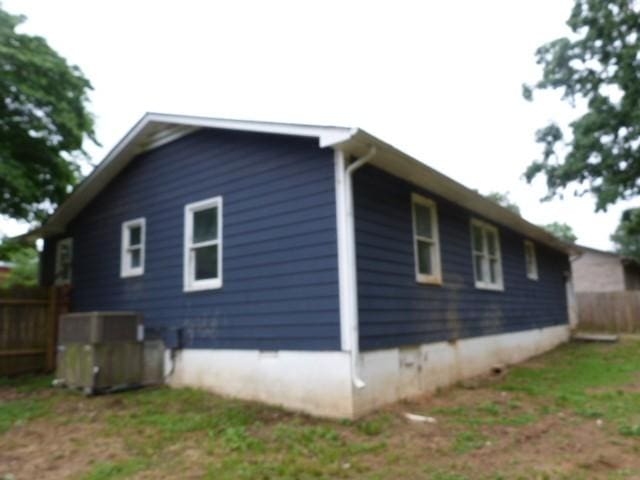 114 Bruce St, Huntland, TN 37345 - view of property exterior featuring fence and crawl space