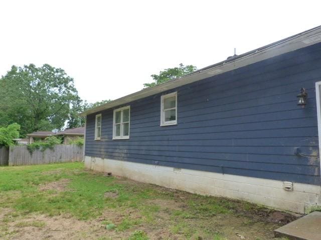 114 Bruce St, Huntland, TN 37345 - view of property exterior featuring fence and crawl space