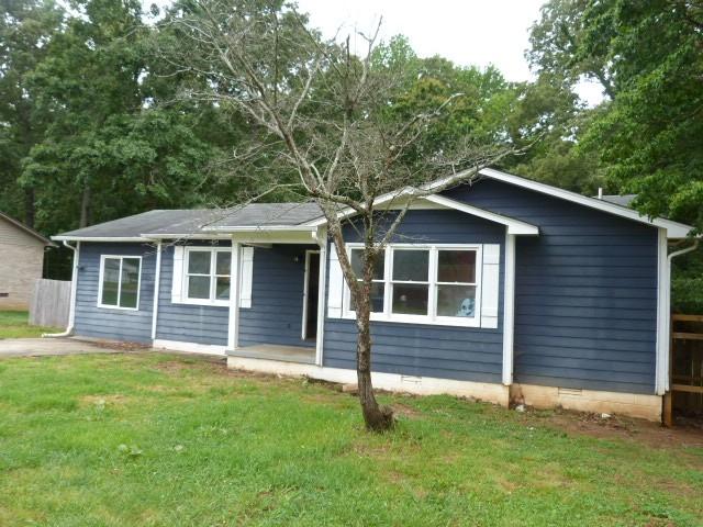 114 Bruce St, Huntland, TN 37345 - view of front facade featuring a front lawn and crawl space