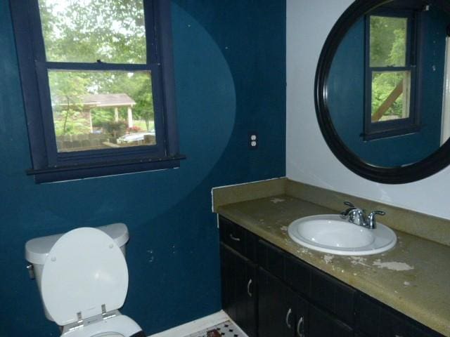114 Bruce St, Huntland, TN 37345 - half bathroom with toilet, vanity, and baseboards
