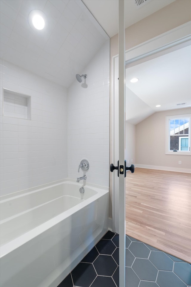 1908 Beechwood Ave, Nashville, TN 37212 - bathroom featuring lofted ceiling,  shower combination, tile patterned flooring, and recessed lighting