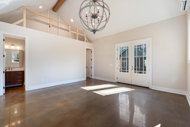 1908 Beechwood Ave, Nashville, TN 37212 - spare room featuring french doors, beam ceiling, baseboards, a chandelier, and high vaulted ceiling