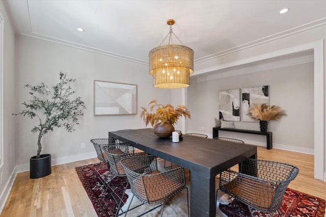 1908 Beechwood Ave, Nashville, TN 37212 - dining area featuring wood finished floors, a chandelier, baseboards, recessed lighting, and crown molding